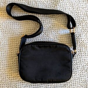 a new day | black crossbody bag with leather and gold accents